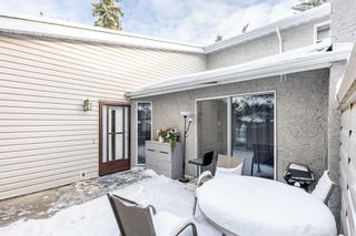 Photo 3: 6 4915 45 Street SW in Calgary: Glamorgan Row/Townhouse for sale : MLS®# A2090969