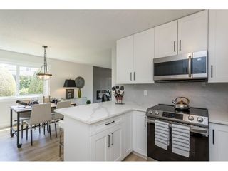 Photo 1: 115 32910 AMICUS Place in Abbotsford: Central Abbotsford Condo for sale in "Royal Oaks" : MLS®# R2698596