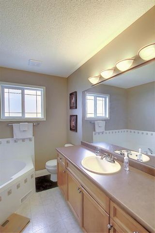 Photo 13: 121 Country Hills Gardens NW in Calgary: Country Hills Row/Townhouse for sale : MLS®# A1057496