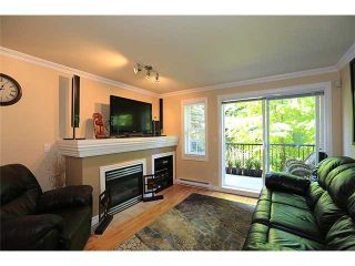 Photo 2: 25 1561 BOOTH Avenue in Coquitlam: Maillardville Townhouse for sale in "The Courcelles" : MLS®# V1026526