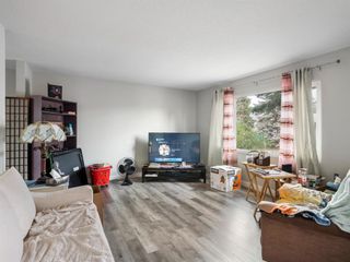 Photo 3: 113 Olympia Drive SE in Calgary: Ogden Detached for sale : MLS®# A1246700
