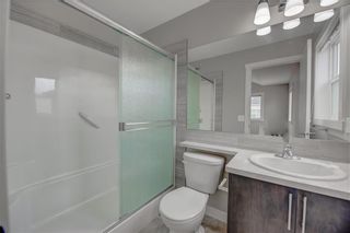Photo 18: 405 Redstone View NE in Calgary: Redstone Row/Townhouse for sale : MLS®# A1224923