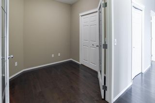 Photo 4: 1406 115 Prestwick Villas SE in Calgary: McKenzie Towne Apartment for sale : MLS®# A2050039