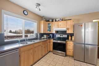 Photo 8: 12256 Canfield Road SW in Calgary: Canyon Meadows Detached for sale : MLS®# A2118064