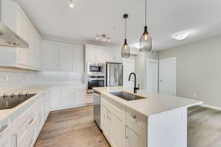 Photo 3: 302 200 Auburn Meadows Common SE in Calgary: Auburn Bay Apartment for sale : MLS®# A2134840