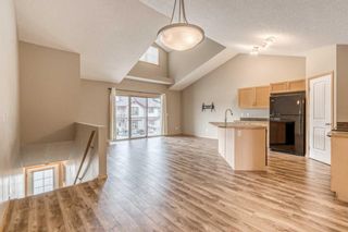 Photo 3: 203 8 Everridge Square SW in Calgary: Evergreen Row/Townhouse for sale : MLS®# A2064052