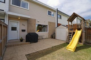 Photo 2: 330 Garry Crescent NE in Calgary: Greenview Row/Townhouse for sale : MLS®# A1218045