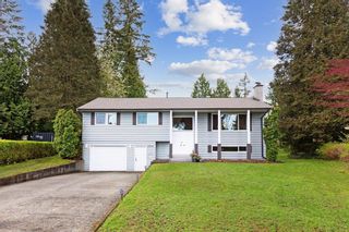 Photo 1: 4561 UPLANDS Drive in Langley: Langley City House for sale : MLS®# R2869925