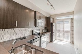 Photo 16: 229 Ascot Circle SW in Calgary: Aspen Woods Row/Townhouse for sale : MLS®# A2059461