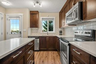 Photo 12: 1307 2400 Ravenswood View SE: Airdrie Row/Townhouse for sale : MLS®# A2130454