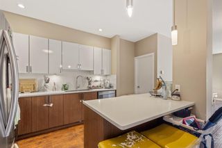 Photo 4: 105 22 Auburn Bay Link SE in Calgary: Auburn Bay Apartment for sale : MLS®# A1233608