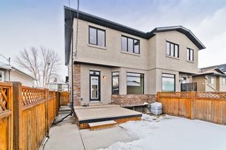 Photo 2: 247 24 Avenue NW in Calgary: Tuxedo Park Semi Detached for sale : MLS®# A1187428
