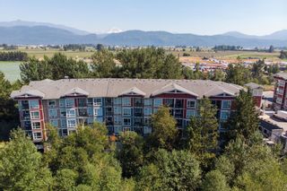 Photo 2: 310 2238 WHATCOM Road in Abbotsford: Abbotsford East Condo for sale in "Waterleaf" : MLS®# R2607465