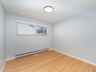 Photo 11: 9032 12 Street SW in Calgary: Haysboro Detached for sale : MLS®# A1217618