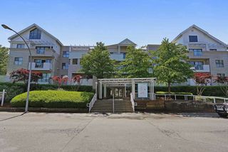 Photo 1: 208 20268 54 AVENUE in Langley: Langley City Condo for sale : MLS®# R2109826