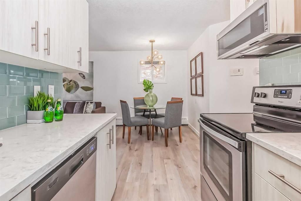 Main Photo: 202 534 20 Avenue SW in Calgary: Cliff Bungalow Apartment for sale : MLS®# A2078596