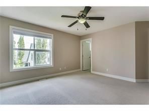 Photo 9: 183 Bridlewood View SW in Calgary: Bridlewood Row/Townhouse for sale : MLS®# A2014089