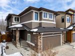 Main Photo: 353 Tremblant Way SW in Calgary: Springbank Hill Detached for sale : MLS®# A2118263