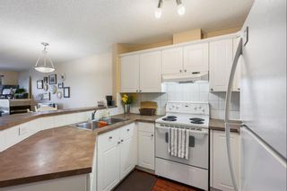 Photo 11: 1220 950 Arbour Lake Road NW in Calgary: Arbour Lake Apartment for sale : MLS®# A2052874