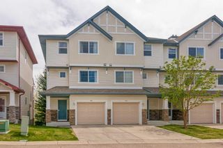 Main Photo: 119 Hidden Creek Cove NW in Calgary: Hidden Valley Row/Townhouse for sale : MLS®# A2136492