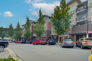 Photo 1: 205 45530 MARKET Way in Chilliwack: Garrison Crossing Condo for sale in "The Residences" (Sardis)  : MLS®# R2708104