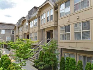 Photo 1: 222 2110 ROWLAND Street in Port Coquitlam: Central Pt Coquitlam Townhouse for sale in "AVIVA ON THE PARK" : MLS®# V1071983