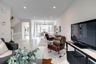Photo 15: 14 Coachway Gardens SW in Calgary: Coach Hill Row/Townhouse for sale : MLS®# A1215253