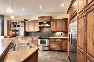 Photo 10: 40 TUSCANY GLEN Road NW in Calgary: Tuscany Detached for sale : MLS®# A1033612