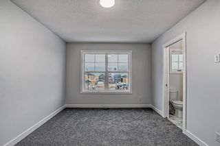 Photo 15: 97 Edith Gate NW in Calgary: C-473 Semi Detached (Half Duplex) for sale : MLS®# A2013248