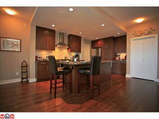 Photo 3: 308 16469 64 Avenue in Surrey: Cloverdale BC Condo for sale in "St. Andrews at Northwest" (Cloverdale)  : MLS®# F1123880