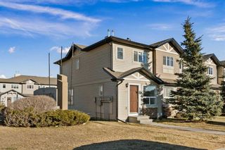 Photo 1: 487 Saddlecrest Boulevard NW in Calgary: Saddle Ridge Row/Townhouse for sale : MLS®# A2096322