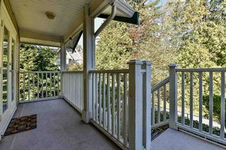 Photo 18: 114 12711 64 Avenue in Surrey: West Newton Townhouse for sale in "PALETTE ON THE PARK" : MLS®# R2102037