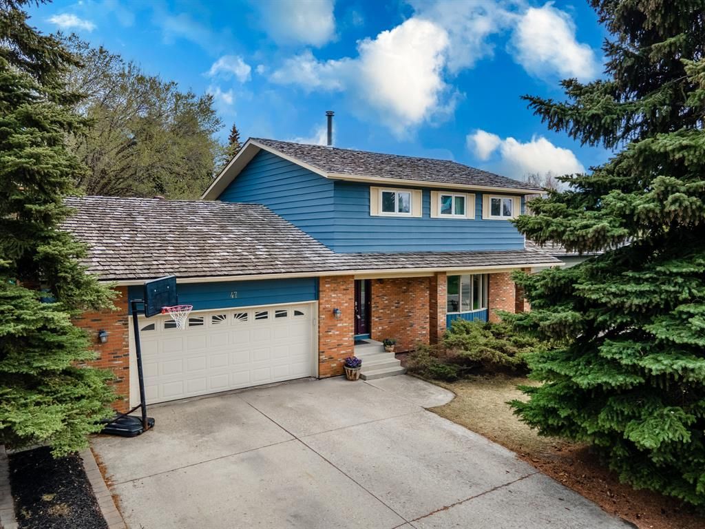 Main Photo: 47 Woodgate Close SW in Calgary: Woodlands Detached for sale : MLS®# A2041725