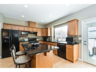Photo 8: 7033 179A Street in Surrey: Cloverdale BC Condo for sale in "Provinceton" (Cloverdale)  : MLS®# R2392761