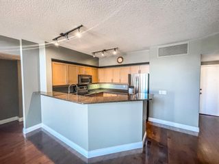 Photo 10: 407 838 19 Avenue SW in Calgary: Lower Mount Royal Apartment for sale : MLS®# A1154775