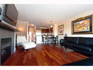 Photo 1: 221 676 W 6TH Avenue in Vancouver: Fairview VW Townhouse for sale in "BOHEMIA" (Vancouver West)  : MLS®# V817357