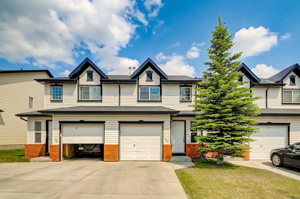 Main Photo: 52 Covemeadow Manor NE in Calgary: Coventry Hills Row/Townhouse for sale : MLS®# A2054046