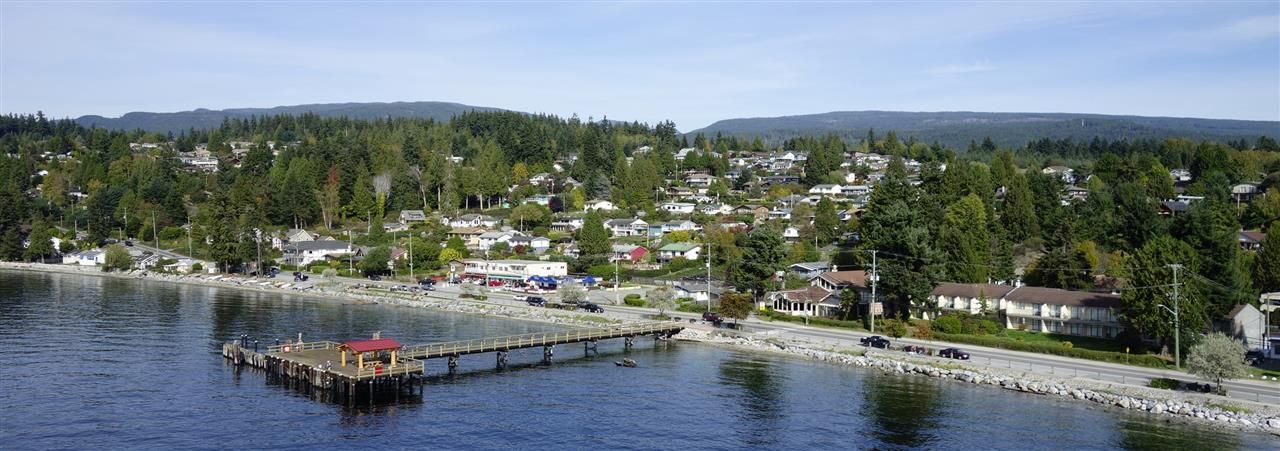 Davis Bay location with seawall, Pier, shops, cafes and restaurants.