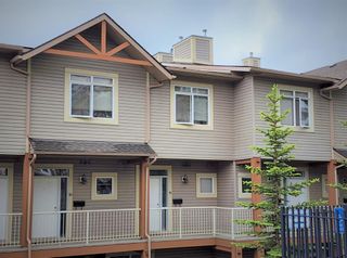 Main Photo: 11 169 Rockyledge View NW in Calgary: Rocky Ridge Row/Townhouse for sale : MLS®# A1256989