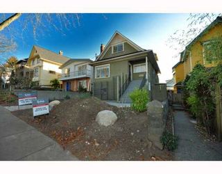 Photo 1: 2056 E 3RD Avenue in Vancouver: Grandview VE House for sale in "COMMERCIAL DRIVE" (Vancouver East)  : MLS®# V799384