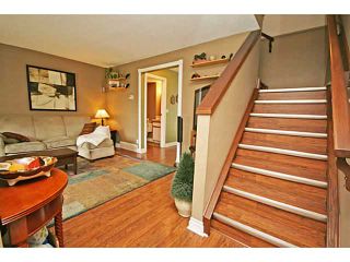 Photo 4: 151 123 QUEENSLAND Drive SE in CALGARY: Queensland Townhouse for sale (Calgary)  : MLS®# C3627911