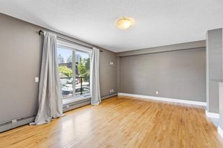 Photo 7: 203 1027 1 Avenue NW in Calgary: Sunnyside Apartment for sale : MLS®# A1234036