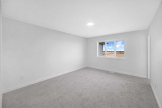 Photo 37: 85 Hanson Lane NE: Langdon Semi Detached (Half Duplex) for sale : MLS®# A2126653