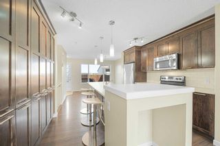 Main Photo: 206 Cranford Park SE in Calgary: Cranston Semi Detached (Half Duplex) for sale : MLS®# A2132570