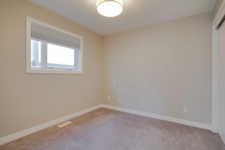 Photo 12: 2 1707 36 Avenue SW in Calgary: Altadore Row/Townhouse for sale : MLS®# A2017441