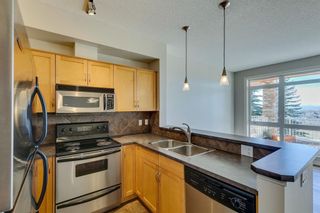 Photo 9: 4 133 Rockyledge View NW in Calgary: Rocky Ridge Row/Townhouse for sale : MLS®# A2094391