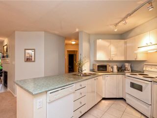 Photo 5: 209 150 W 22ND Street in North Vancouver: Central Lonsdale Condo for sale in "The Sierra" : MLS®# V1007407
