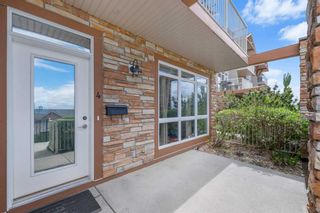 Photo 2: 4 116 Rockyledge View NW in Calgary: Rocky Ridge Apartment for sale : MLS®# A2140683
