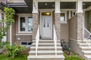 Photo 2: 185 River Heights Drive: Cochrane Row/Townhouse for sale : MLS®# A1245234