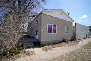 Photo 1: 104 Tupper Street N in Portage la Prairie: Multi-family for sale : MLS®# 202313019